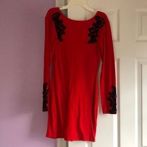 Red mini dress with black embroidered detail